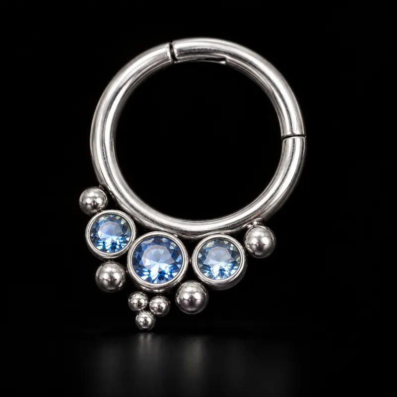 Clicker de septum, trois pierres bleues